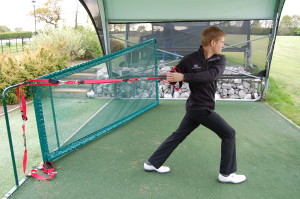 golfer flexibility exercise with trx trainer
